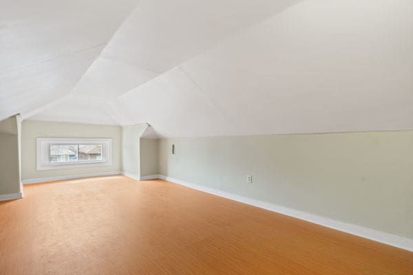 3507 N Osceola Ave, Chicago, IL 60634 - bonus room with baseboards and lofted ceiling