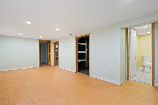 3507 N Osceola Ave, Chicago, IL 60634 - empty room with light wood finished floors and recessed lighting