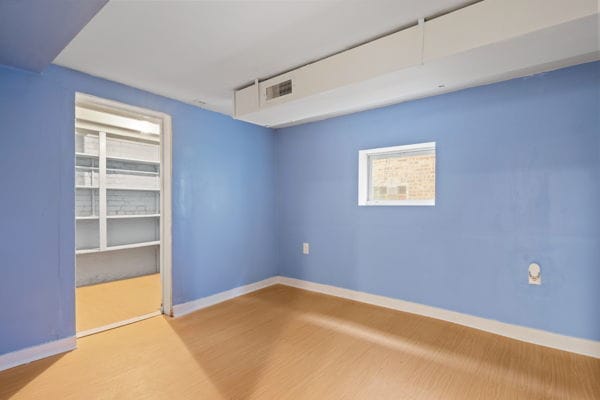 3507 N Osceola Ave, Chicago, IL 60634 - spare room with wood finished floors and baseboards