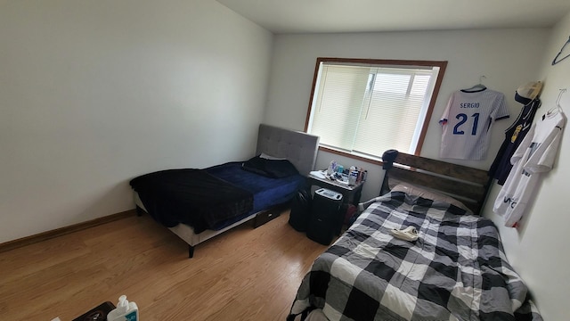 6084 Fremont Dr Unit 6084, Hanover Park, IL 60133 - bedroom with wood finished floors
