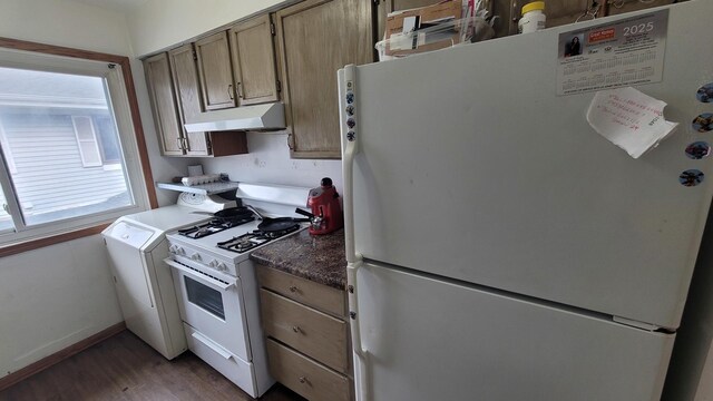 6084 Fremont Dr Unit 6084, Hanover Park, IL 60133 - kitchen featuring under cabinet range hood, white appliances, dark wood-style floors, and baseboards