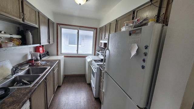 6084 Fremont Dr Unit 6084, Hanover Park, IL 60133 - kitchen with white appliances, hardwood / wood-style floors, a sink, washer / dryer, and baseboards