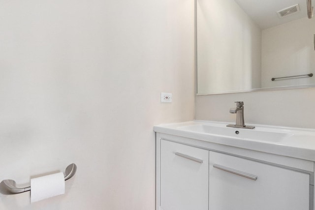 bathroom featuring visible vents and vanity