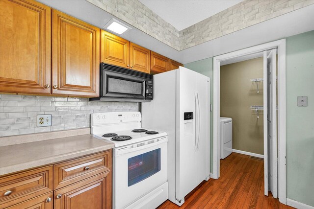 2240 Marilyn Dr, Saint Joseph, IL 61873 - kitchen with white appliances, washer / clothes dryer, light countertops, tasteful backsplash, and brown cabinets