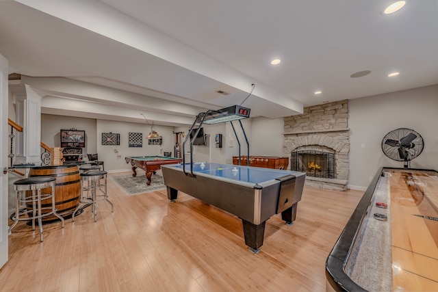 playroom featuring light wood finished floors, baseboards, recessed lighting, billiards, and a fireplace
