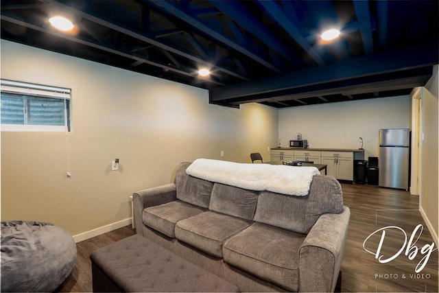 living area with baseboards and dark wood-style flooring