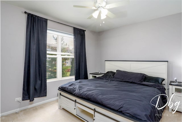 2272 Iroquois Ln, Round Lake Heights, IL 60073 - bedroom featuring a ceiling fan, baseboards, and light colored carpet