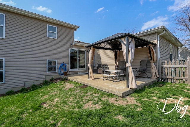 2272 Iroquois Ln, Round Lake Heights, IL 60073 - back of house featuring a gazebo, a lawn, fence, and a patio
