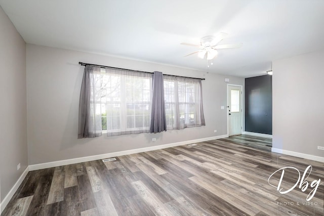 2272 Iroquois Ln, Round Lake Heights, IL 60073 - spare room with baseboards, ceiling fan, and wood finished floors