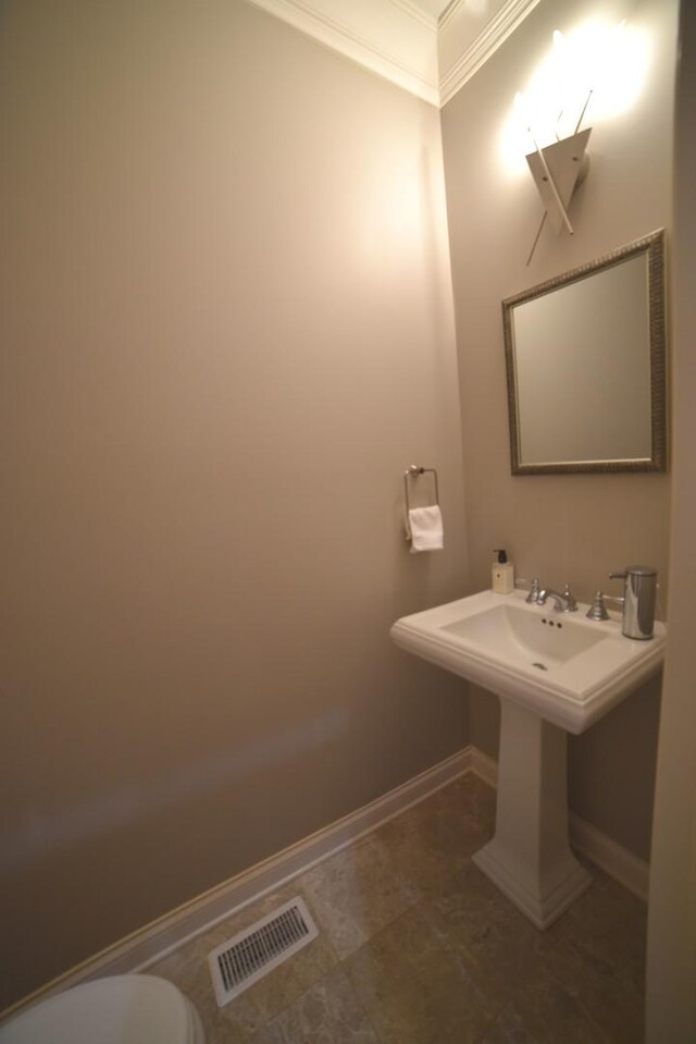 hallway with an upstairs landing, recessed lighting, crown molding, and carpet flooring