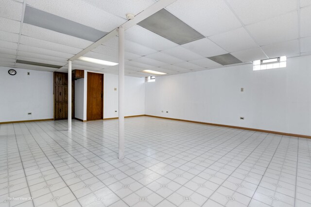16921 84th Ave, Tinley Park, IL 60477 - basement featuring a drop ceiling, baseboards, and tile patterned floors