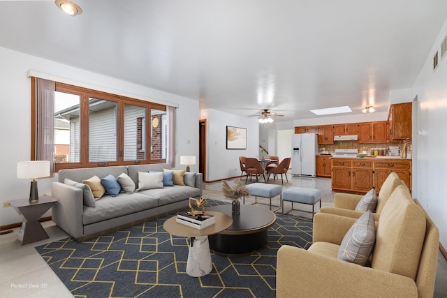 16921 84th Ave, Tinley Park, IL 60477 - living area featuring ceiling fan and baseboards