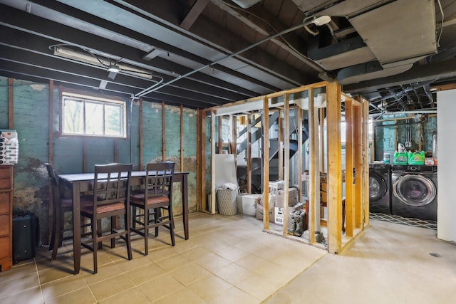 basement featuring separate washer and dryer