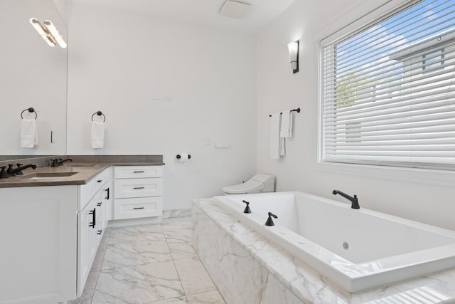 1431 N Mohawk St, Chicago, IL 60610 - full bathroom featuring marble look tile flooring, vanity, and a whirlpool tub