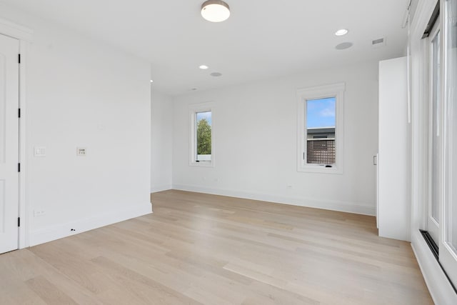 1431 N Mohawk St, Chicago, IL 60610 - spare room with light wood-style floors, recessed lighting, and baseboards