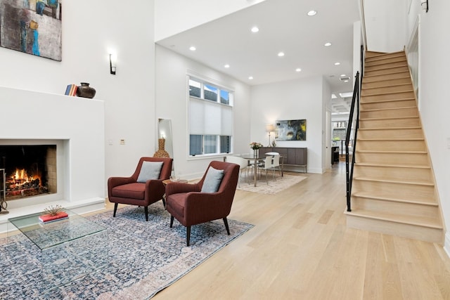 1431 N Mohawk St, Chicago, IL 60610 - living room with wood finished floors, recessed lighting, healthy amount of natural light, stairs, and a high ceiling