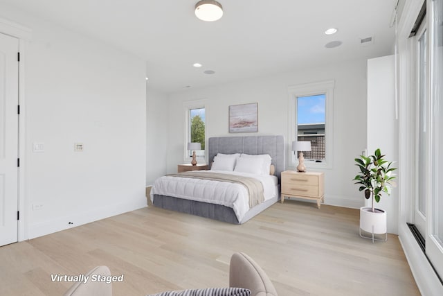 1431 N Mohawk St, Chicago, IL 60610 - bedroom with light wood-style floors, recessed lighting, and baseboards