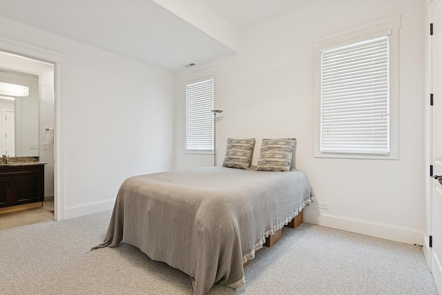 1431 N Mohawk St, Chicago, IL 60610 - bedroom featuring light colored carpet, baseboards, and ensuite bath