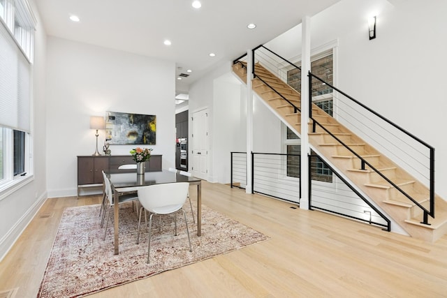 1431 N Mohawk St, Chicago, IL 60610 - dining room with wood finished floors, stairway, recessed lighting, and baseboards