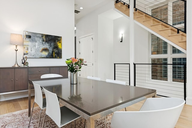 1431 N Mohawk St, Chicago, IL 60610 - dining area with wood finished floors, stairway, and recessed lighting