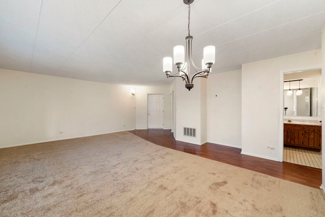 9810 Mill Dr W Unit 1B, Palos Park, IL 60464 - interior space with dark carpet, baseboards, a chandelier, and visible vents