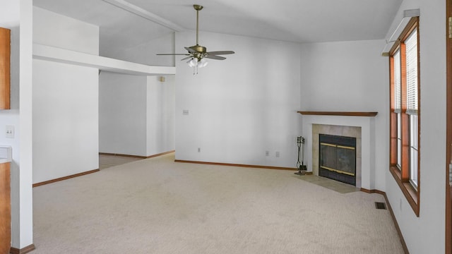 821 Park Dr, Rantoul, IL 61866 - unfurnished living room with carpet, a fireplace, a ceiling fan, and baseboards