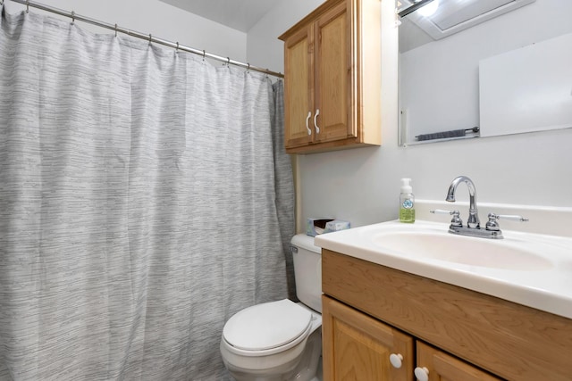 28 Jamaica Colony Unit 5, Fox Lake, IL 60020 - bathroom with vanity, toilet, and curtained shower