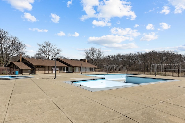 28 Jamaica Colony Unit 5, Fox Lake, IL 60020 - community pool featuring a patio area and a jacuzzi
