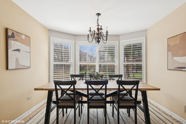 2828 Ashton Ct, Westchester, IL 60154 - dining room with an inviting chandelier and baseboards