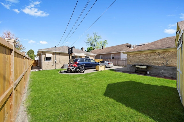 view of yard featuring central AC unit