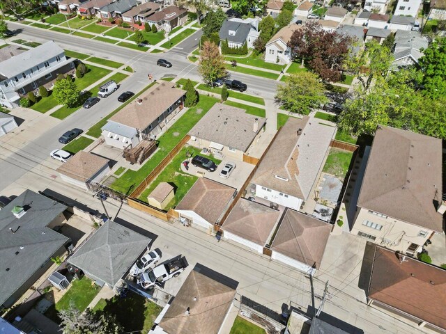 aerial view of property's location with nearby suburban area