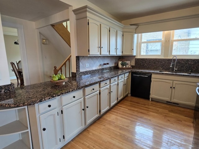 7324 W Lunt Ave, Chicago, IL 60631 - kitchen featuring backsplash, light wood-style floors, dishwasher, and a sink