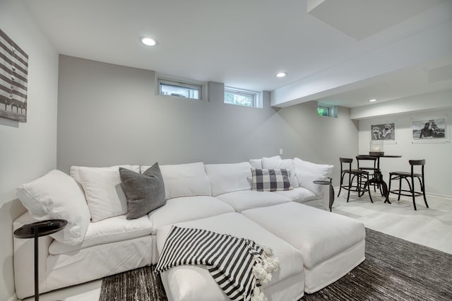 living room featuring recessed lighting and wood finished floors