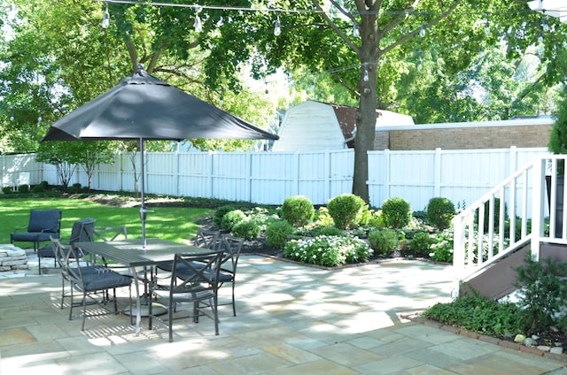 view of patio / terrace with a fenced backyard and outdoor dining space