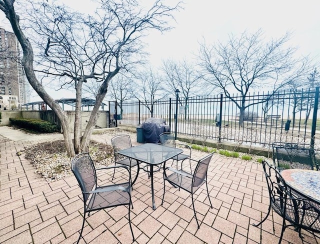 view of patio / terrace featuring a water view