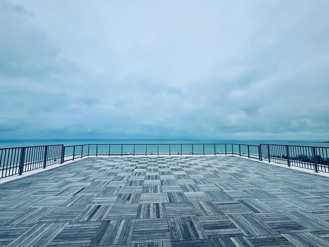 view of patio / terrace featuring a water view