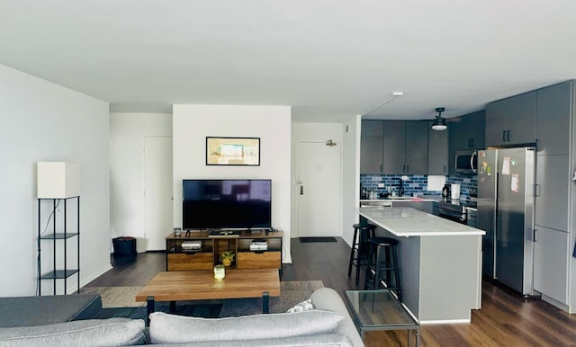 living area featuring dark wood-style flooring