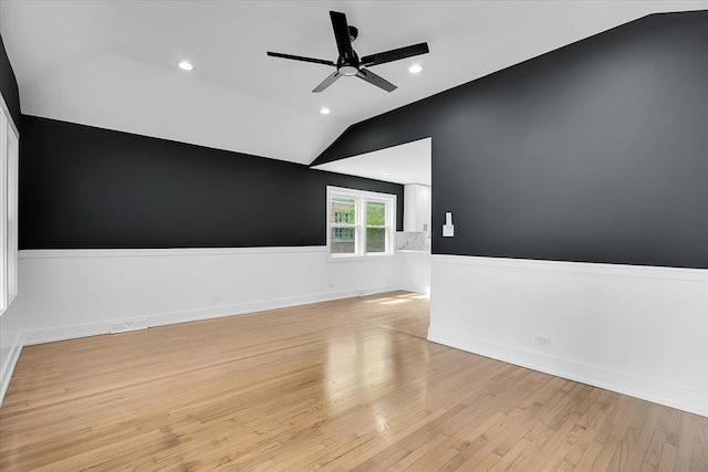 314 W 106th Pl, Chicago, IL 60628 - unfurnished room with lofted ceiling, light wood-style flooring, ceiling fan, and recessed lighting
