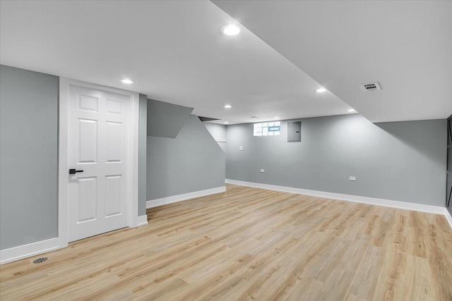 314 W 106th Pl, Chicago, IL 60628 - basement with light wood-style flooring, baseboards, and recessed lighting