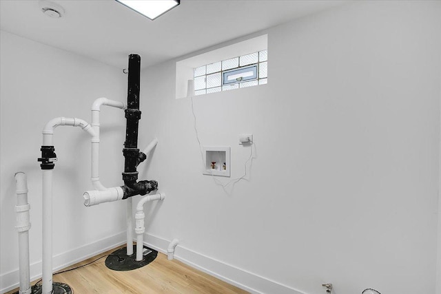 314 W 106th Pl, Chicago, IL 60628 - washroom featuring hookup for a washing machine, light wood finished floors, and baseboards
