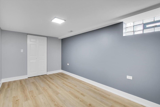 314 W 106th Pl, Chicago, IL 60628 - basement with light wood-style flooring and baseboards