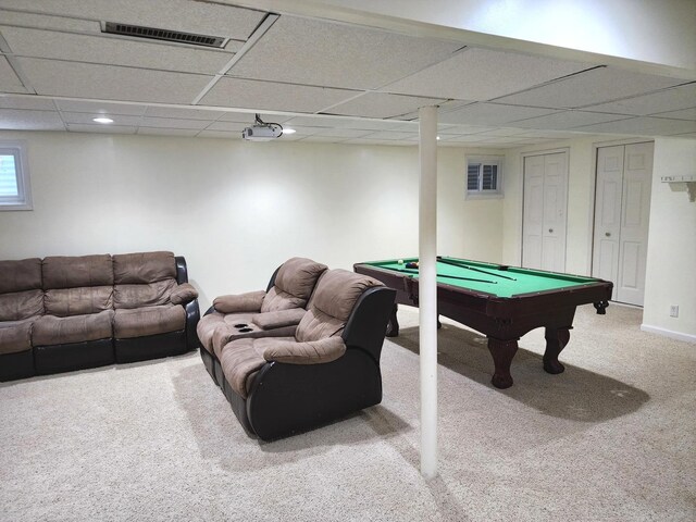 playroom featuring a drop ceiling, baseboards, and carpet floors