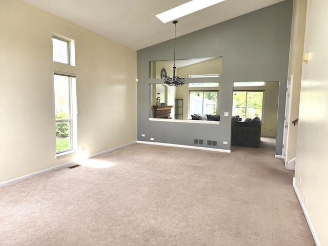 empty room with baseboards and carpet floors