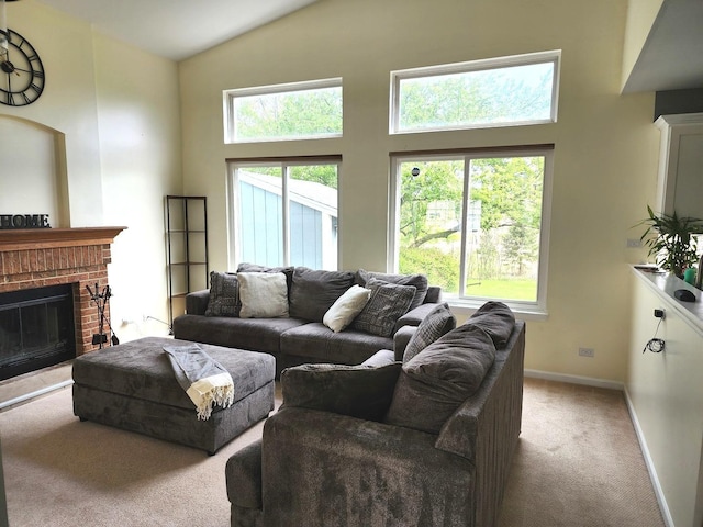 carpeted living area with a wealth of natural light and a towering ceiling