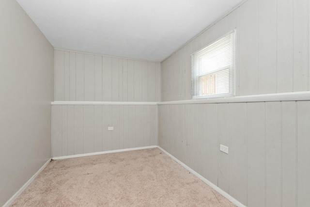 742 Newell Ave, Calumet City, IL 60409 - carpeted empty room featuring baseboards and wooden walls