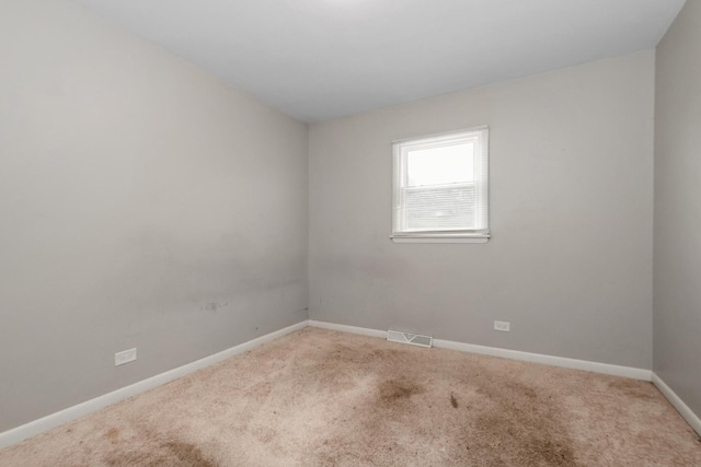 742 Newell Ave, Calumet City, IL 60409 - unfurnished room with carpet flooring, visible vents, and baseboards