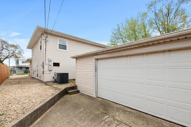 742 Newell Ave, Calumet City, IL 60409 - view of side of property with driveway, a garage, and central AC unit