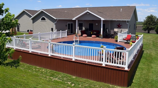 exterior space with a wooden deck and a yard