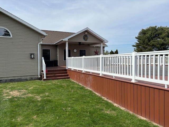 back of property with a yard