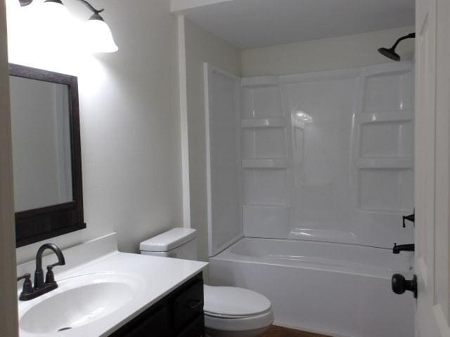908 Merrill Ave, Loves Park, IL 61111 - full bath featuring shower / bathing tub combination, vanity, and toilet
